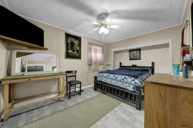 bedroom featuring ceiling fan, cooling unit, and ornamental molding