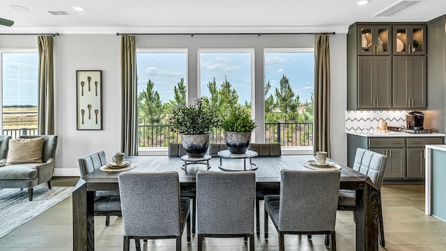 dining room featuring light hardwood / wood-style flooring