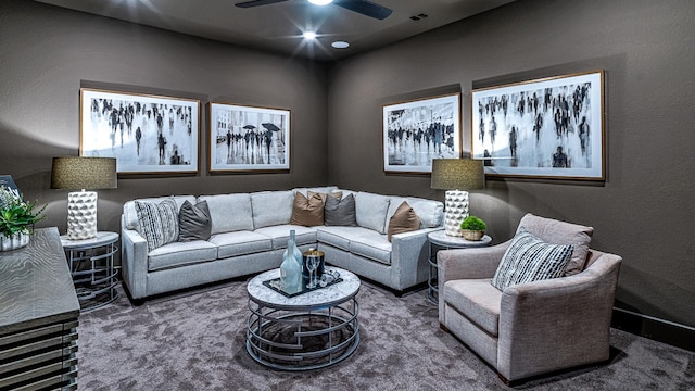 carpeted living room featuring ceiling fan