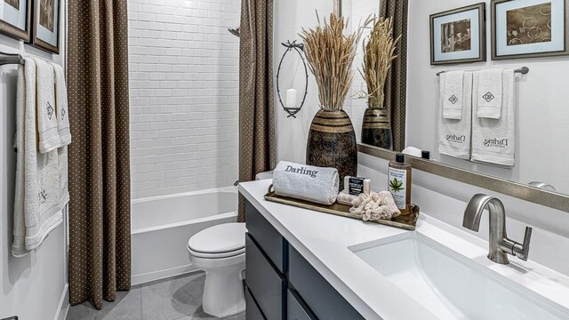 full bathroom featuring vanity, toilet, and shower / bathtub combination with curtain