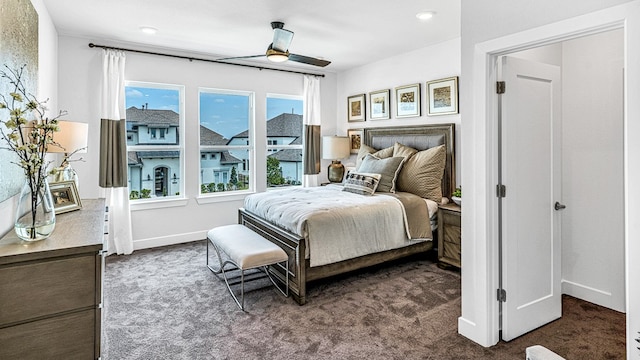 carpeted bedroom with ceiling fan