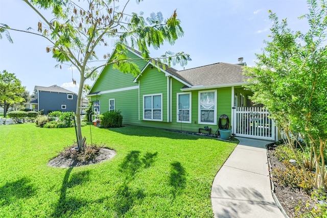 view of front of house with a front yard