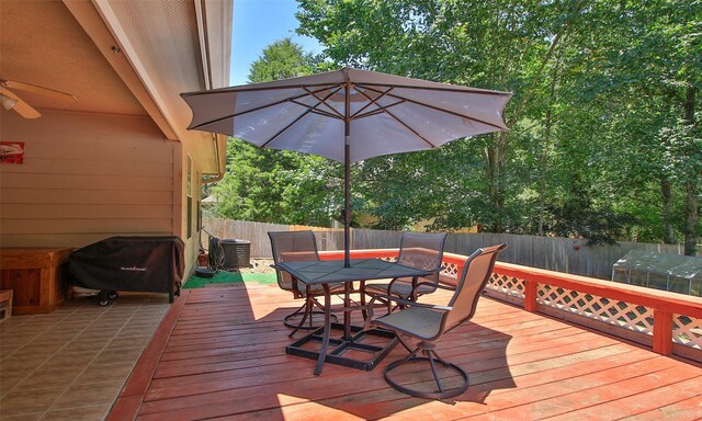 deck featuring ceiling fan and grilling area