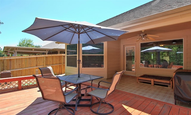 wooden deck with ceiling fan