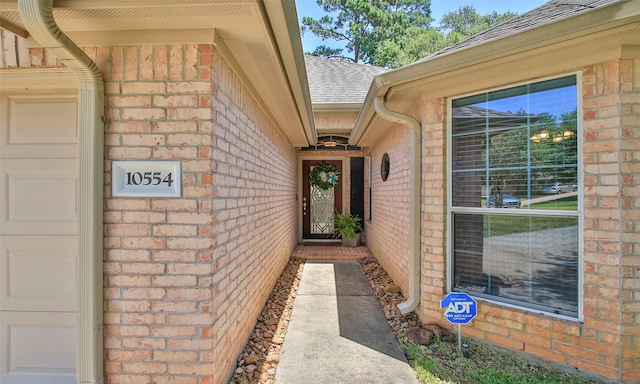 property entrance featuring a garage