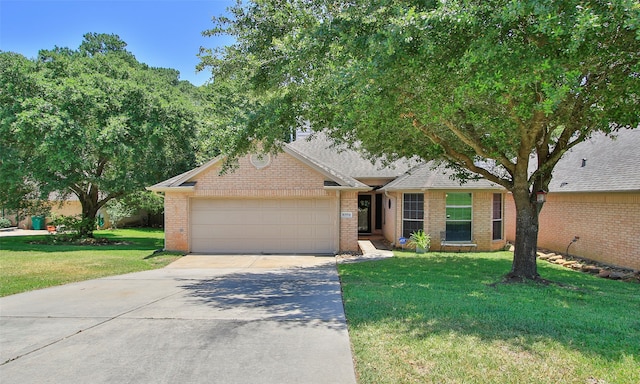 single story home with a garage and a front lawn