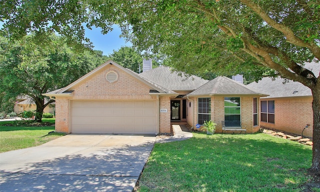 single story home featuring a front lawn and a garage