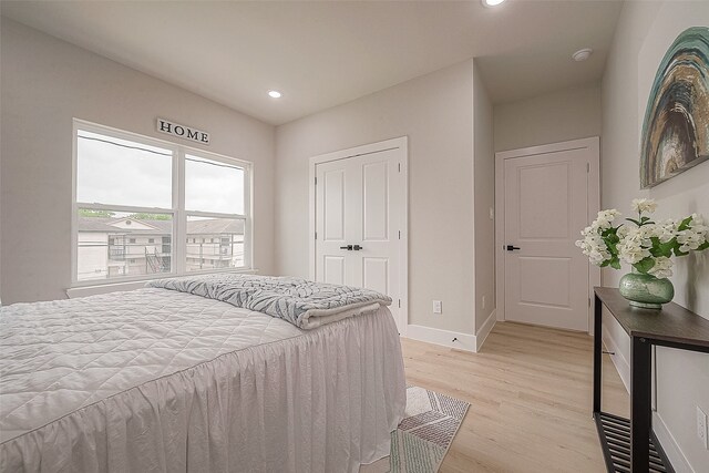 3837 Mainer St, Houston, TX 77021 - bedroom with a closet and light hardwood / wood-style flooring