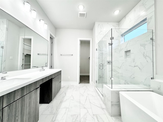 bathroom featuring vanity and plus walk in shower