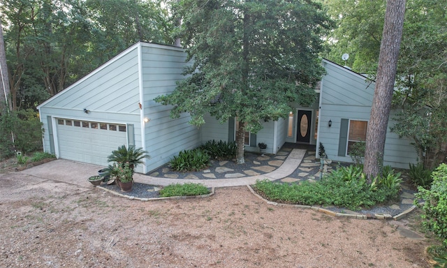 view of front of property with a garage