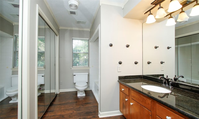 full bathroom with vanity, hardwood / wood-style flooring, toilet, and crown molding