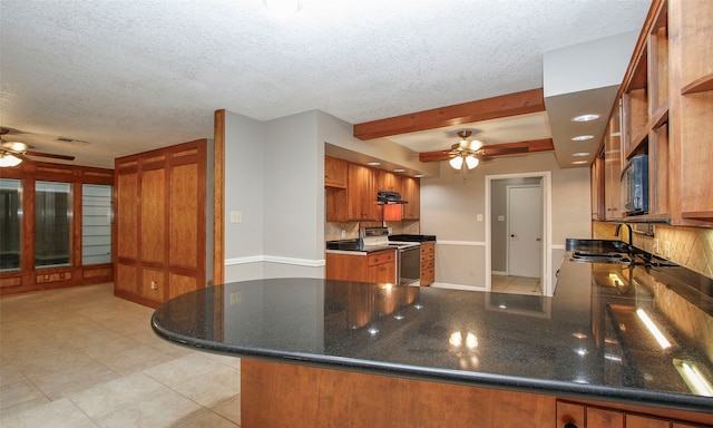 kitchen featuring ceiling fan, sink, white electric stove, kitchen peninsula, and a textured ceiling