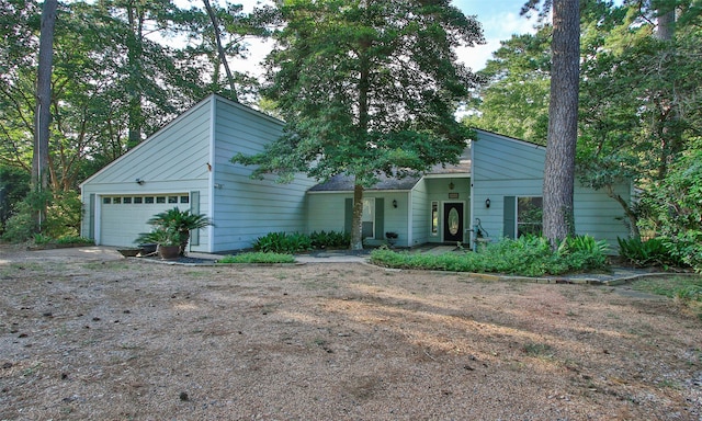 view of front of home with a garage