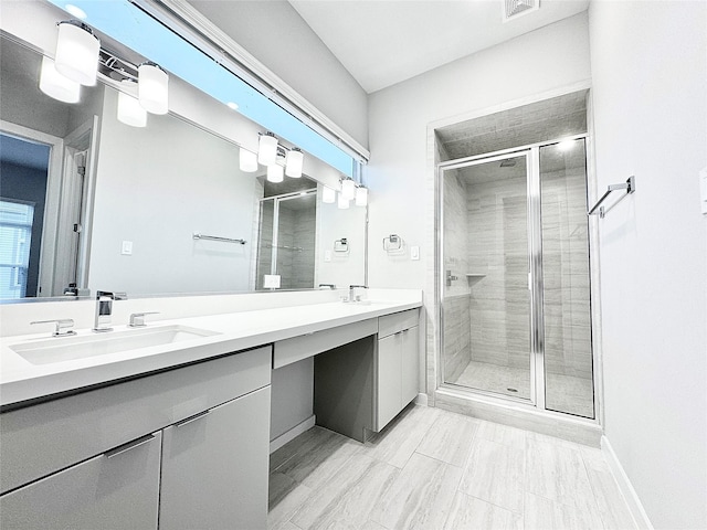 bathroom featuring vanity, wood-type flooring, and an enclosed shower