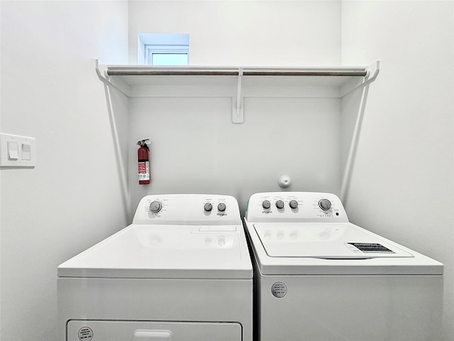 laundry area with washer and dryer