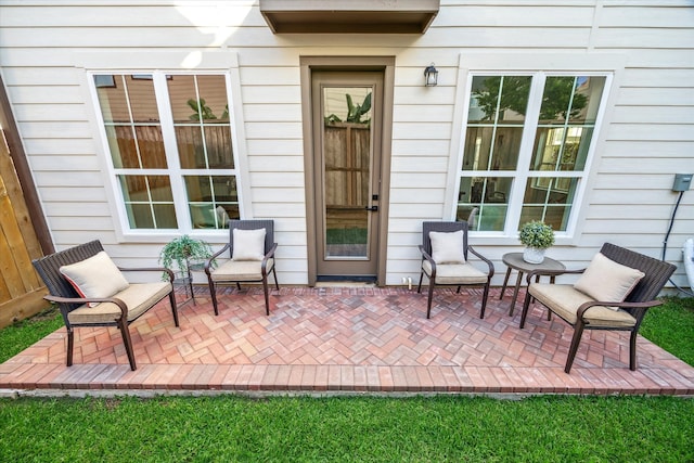 doorway to property featuring a patio area