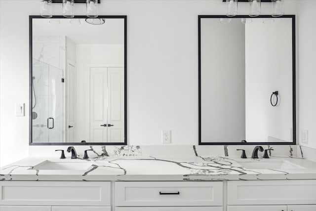 bathroom with vanity and walk in shower