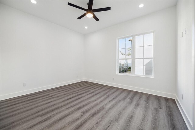 unfurnished room featuring hardwood / wood-style floors and ceiling fan