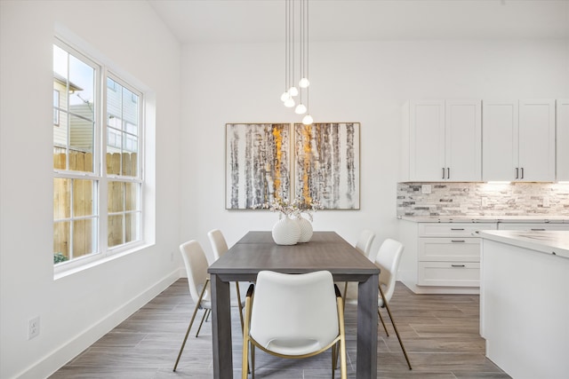 dining area featuring dark hardwood / wood-style floors