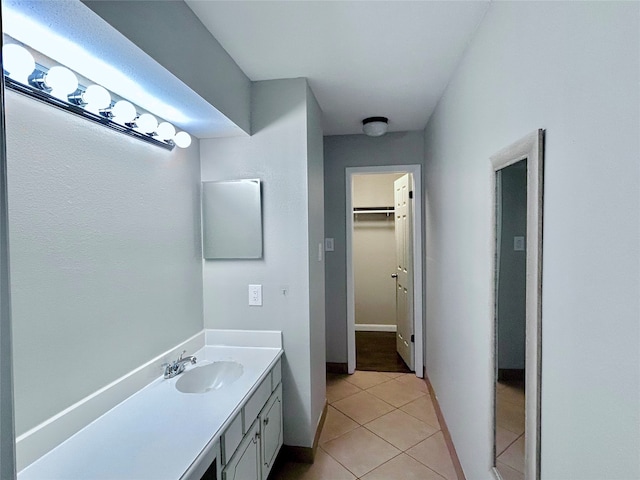 bathroom featuring tile patterned floors and vanity