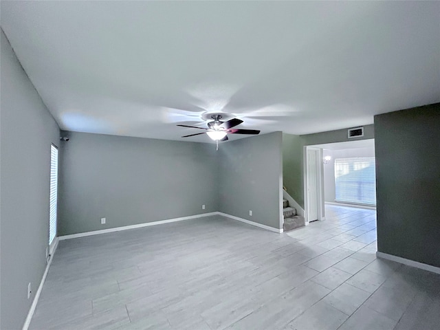 spare room with ceiling fan