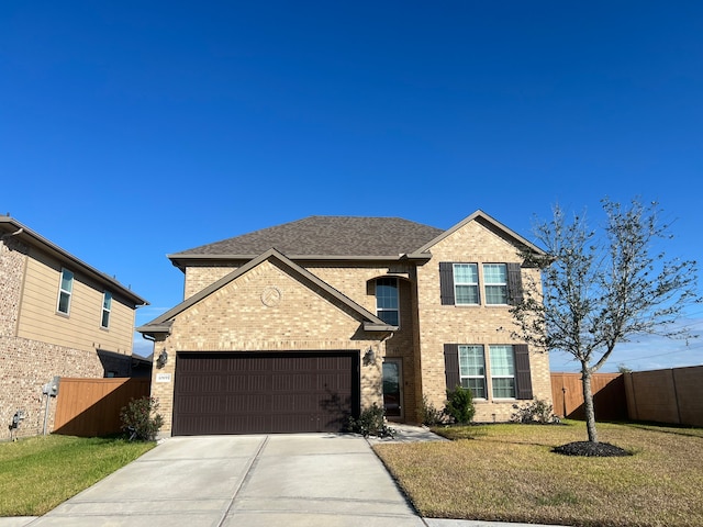 front facade featuring a front yard