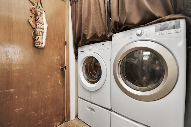 washroom featuring separate washer and dryer