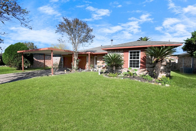 ranch-style house with a carport, central AC, and a front lawn