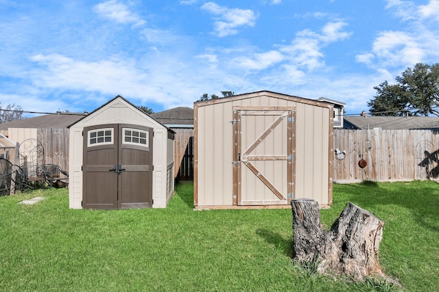 view of outdoor structure featuring a lawn