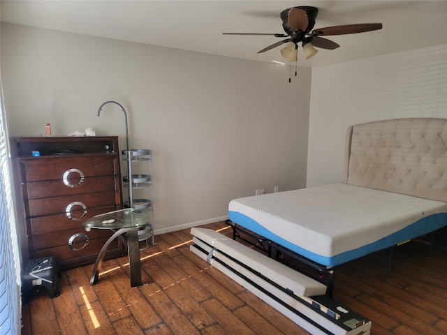 bedroom featuring ceiling fan and dark wood-type flooring