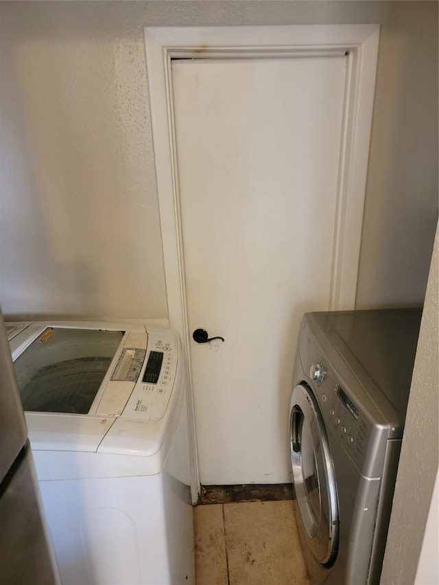 laundry area featuring washing machine and dryer