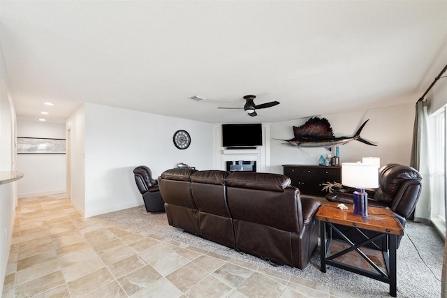 living room with ceiling fan