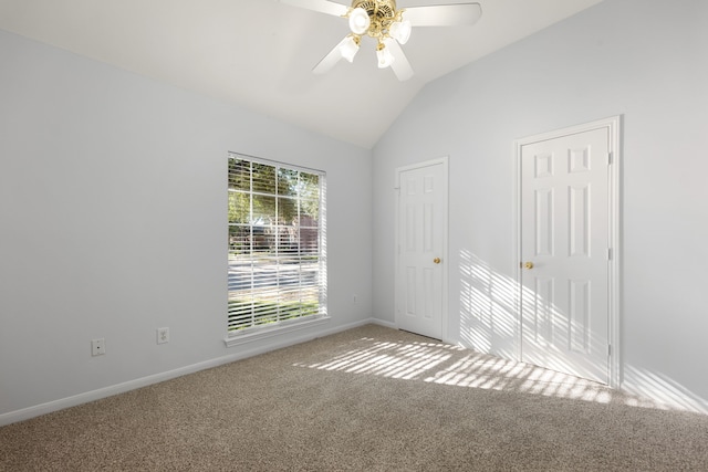 unfurnished room featuring carpet floors, ceiling fan, and lofted ceiling