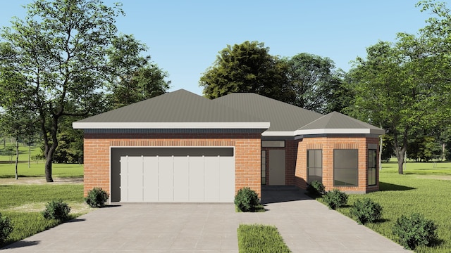 view of front of home featuring a front yard and a garage