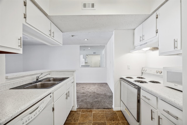 kitchen with white cabinetry, sink, extractor fan, and white appliances