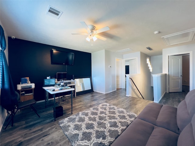 interior space featuring ceiling fan and dark wood-type flooring