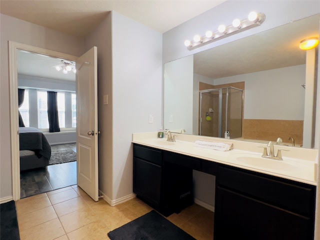 bathroom featuring separate shower and tub, tile patterned flooring, and vanity