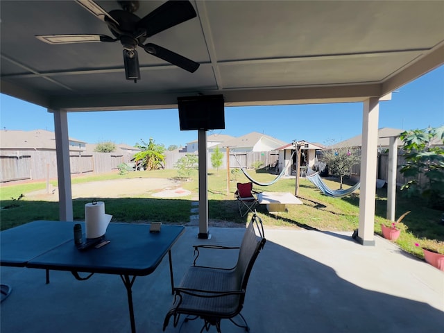 view of patio / terrace featuring ceiling fan