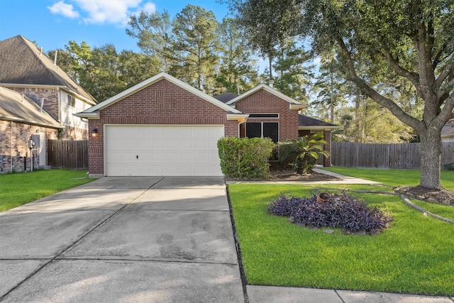 view of front facade featuring a garage and a front lawn