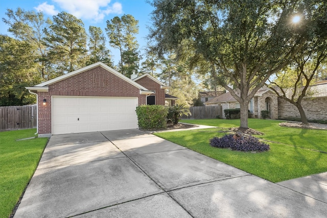 ranch-style home with a garage and a front lawn