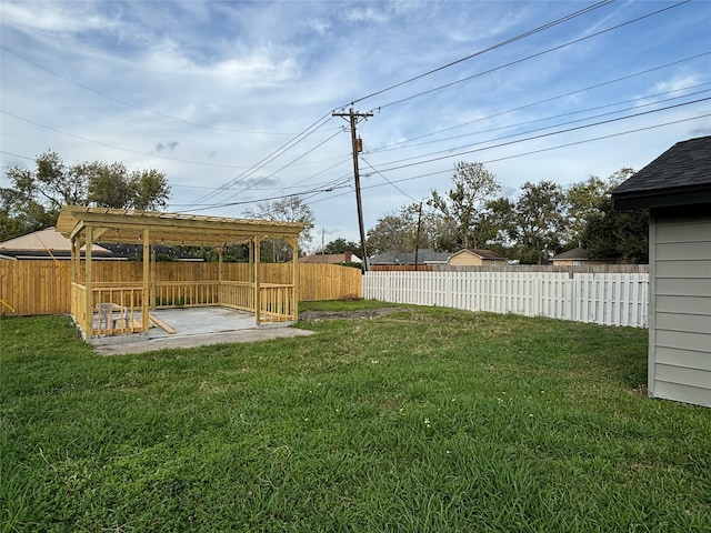 view of yard featuring a pergola and a patio