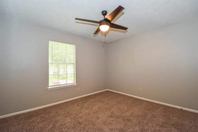 unfurnished room featuring carpet floors and ceiling fan