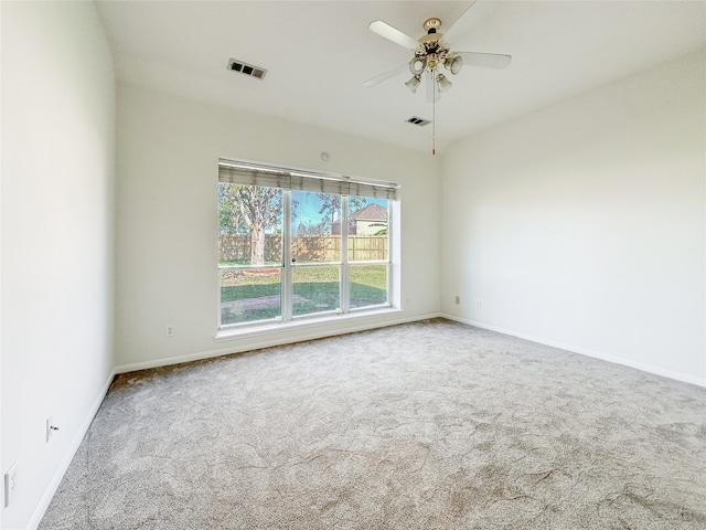 carpeted empty room with ceiling fan