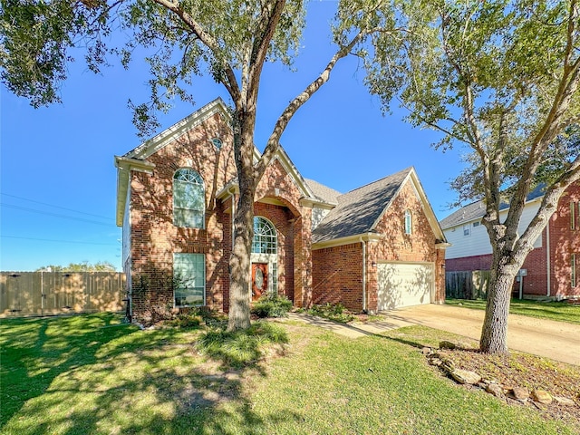 view of front of property featuring a garage and a front yard