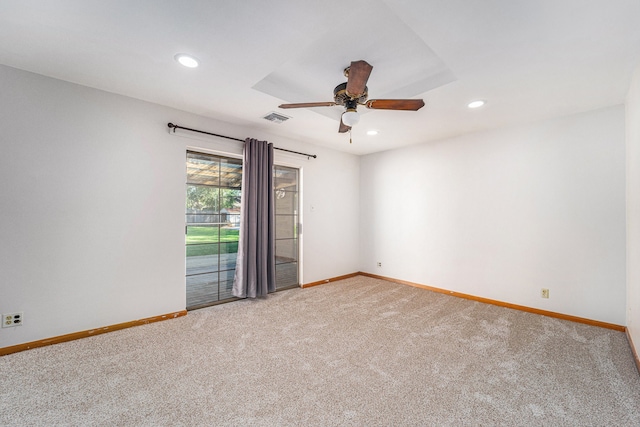 empty room featuring carpet and ceiling fan