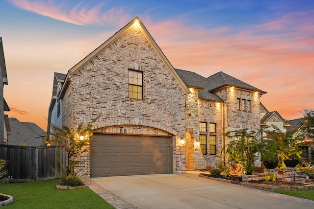 view of front of property featuring a garage