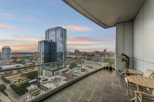 view of balcony at dusk