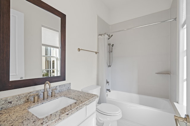 full bathroom featuring vanity, toilet, and shower / tub combo with curtain