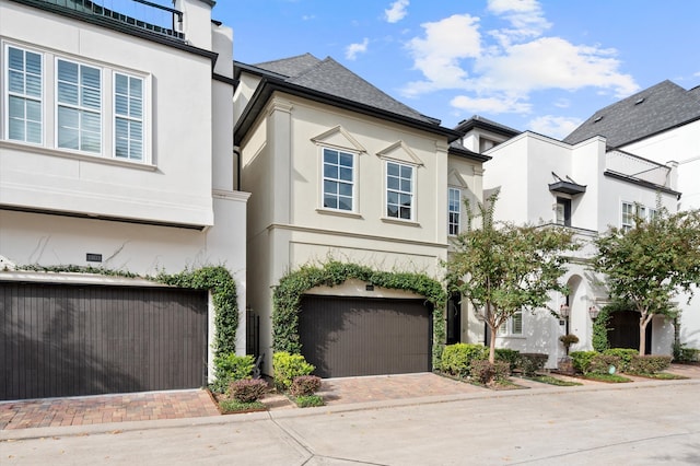 view of front of property featuring a garage