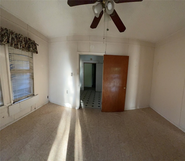 spare room featuring ceiling fan